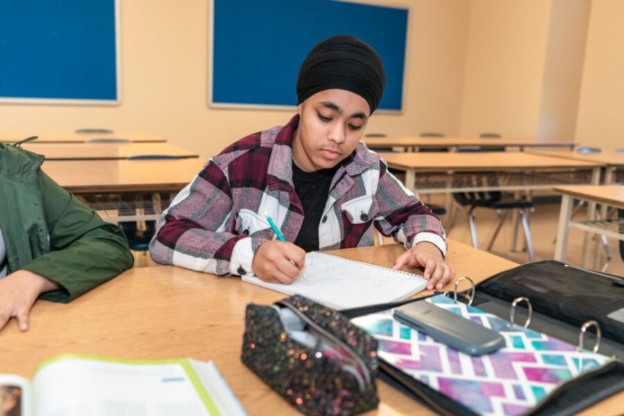 Student writing notebook