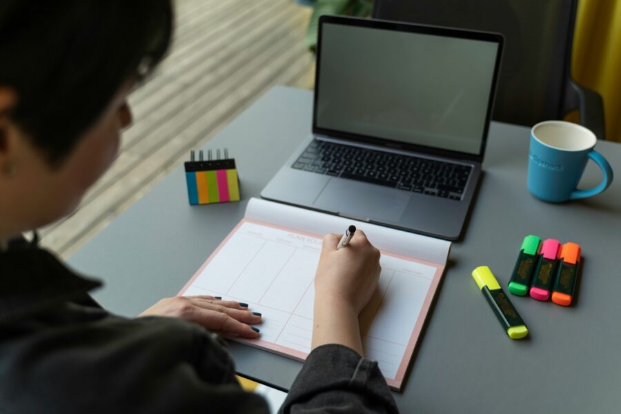 Student reading laptop