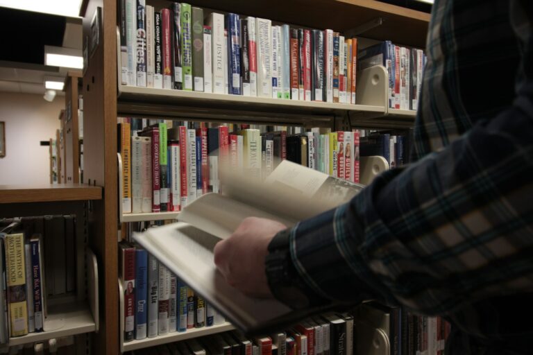 Researcher reading journal