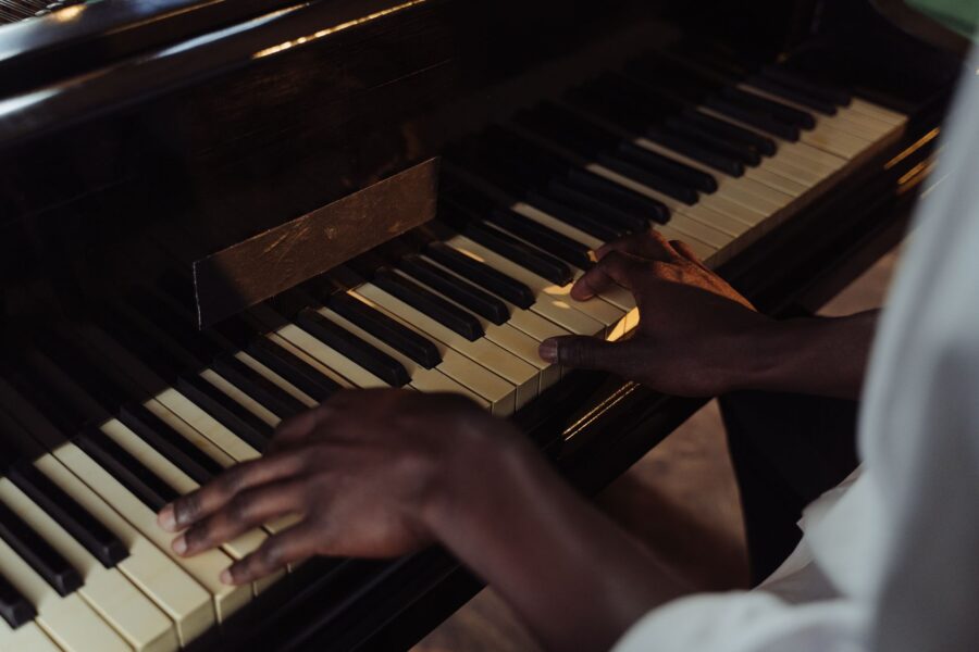 Person practicing piano