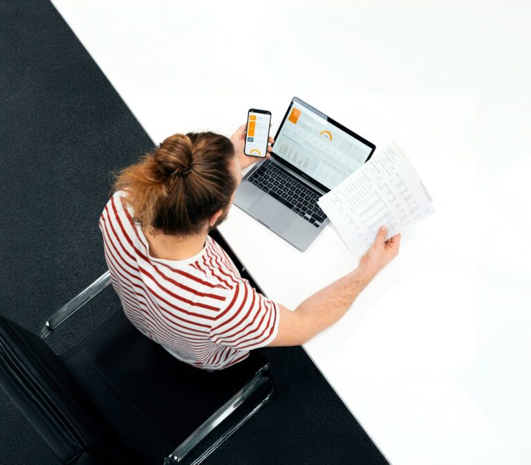 Researcher reading printed